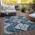 8' X 10' Navy Blue Beige And Ivory Medallion Washable Indoor Outdoor Area Rug