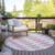 8' Pink And Ivory Round Geometric Washable Indoor Outdoor Area Rug