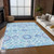 9' X 12' Sky Blue And Lavender Floral Washable Indoor Outdoor Area Rug
