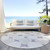 8' Lavender Beige And Ivory Round Abstract Washable Indoor Outdoor Area Rug