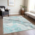 9' X 12' Teal Blue And Silver Abstract Washable Indoor Outdoor Area Rug