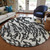 8' Black Gray And Ivory Round Animal Print Washable Indoor Outdoor Area Rug