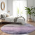 8' Lavender And Lilac Round Striped Washable Indoor Outdoor Area Rug