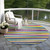 8' Blue Green And Copper Round Striped Washable Indoor Outdoor Area Rug