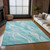 8' X 10' Teal Blue Aqua And Ivory Abstract Washable Indoor Outdoor Area Rug