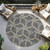 8' Charcoal And Gold Round Geometric Washable Indoor Outdoor Area Rug