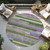 8' Moss Green Olive Green And Purple Round Striped Washable Indoor Outdoor Area Rug