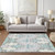 8' X 10' Mint Green Teal Blue And Ivory Ikat Washable Indoor Outdoor Area Rug