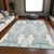 8' X 10' Mint Green Teal Blue And Ivory Ikat Washable Indoor Outdoor Area Rug