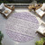 8' Purple Lavender And Ivory Round Geometric Washable Indoor Outdoor Area Rug