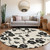 8' Ivory And Black Round Floral Washable Indoor Outdoor Area Rug