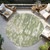 8' Sage And Ivory Round Abstract Washable Indoor Outdoor Area Rug