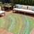 9' X 12' Green Peach And Gold Abstract Washable Indoor Outdoor Area Rug