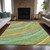 9' X 12' Green Peach And Gold Abstract Washable Indoor Outdoor Area Rug