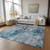 9' X 12' Teal Blue And Navy Blue Abstract Washable Indoor Outdoor Area Rug