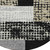 8' Black Taupe And Ivory Round Geometric Washable Indoor Outdoor Area Rug