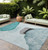 8' X 10' Ivory Teal and Gray Abstract Washable Non Skid Indoor Outdoor Area Rug