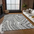 9' X 12' Gray Charcoal And Ivory Abstract Washable Indoor Outdoor Area Rug