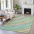 8' X 10' Teal Blue Pink And Peach Abstract Washable Indoor Outdoor Area Rug