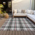 9' X 12' Black Ivory And Red Plaid Washable Indoor Outdoor Area Rug