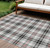 9' X 12' Black Ivory And Red Plaid Washable Indoor Outdoor Area Rug