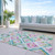 10' X 14' Teal Blue Green And Purple Geometric Washable Indoor Outdoor Area Rug