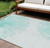 10' X 14' Aquamarine And Ivory Abstract Washable Indoor Outdoor Area Rug