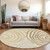 8' Gold Ivory And Beige Round Abstract Washable Indoor Outdoor Area Rug