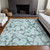 10' X 14' Teal Floral Washable Non Skid Indoor Outdoor Area Rug