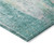 9' X 12' Teal Blue Peach And Ivory Abstract Washable Indoor Outdoor Area Rug