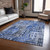9' X 12' Navy Blue And Sky Blue Village Houses Washable Indoor Outdoor Area Rug