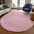 8' Pink Copper And Ivory Round Geometric Washable Indoor Outdoor Area Rug