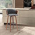 30" Gray And Wood Brown Faux Leather Swivel Bar Height Bar Chair