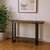 47" Brown and Black Wood and Metal Distressed Sled Console Table With Shelf