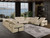 Beige Italian Leather Power Reclining U Shaped Twelve Piece Sectional With Console