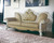 93" Golden Brown Faux Leather Sofa And Toss Pillows With Pearl Legs
