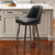 26" Black And Bronze Faux Leather And Steel Counter Height Swivel Bar Chair