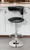 Black and Silver Faux Leather and Metal Low Back Adjustable Height Bar Chair