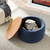 26" Blue and Brown Fabric And Wood Reversible Tray Top Round Storage Ottoman