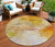 8' Orange Copper And Terra Cotta Round Abstract Washable Indoor Outdoor Area Rug
