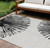 8' X 10' Black And Ivory Abstract Washable Indoor Outdoor Area Rug