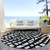 8' Black And Ivory Round Abstract Washable Indoor Outdoor Area Rug