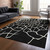 10' X 14' Black And Beige Abstract Washable Indoor Outdoor Area Rug