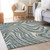 9' X 12' Teal Blue Gray And Taupe Abstract Washable Indoor Outdoor Area Rug