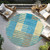 8' Teal Blue Orange And Sky Blue Round Striped Washable Indoor Outdoor Area Rug