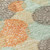 9' X 12' Beige Aqua And Orange Polka Dot Washable Indoor Outdoor Area Rug