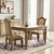 Set of Two Tufted Bone and Brass Upholstered Faux Leather And Wood Dining Side Chairs