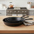 Set of Three Black Cast Iron Frying Pans