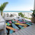 10' X 14' Black Pink And Yellow Striped Washable Indoor Outdoor Area Rug
