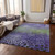 9' X 12' Purple Green And Black Abstract Washable Indoor Outdoor Area Rug